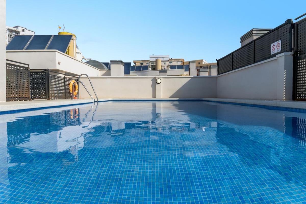 -Malagasunapts- Stylish City Centre Pool&Parking Exterior photo
